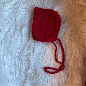 Hand knit red pixie newborn baby bonnet